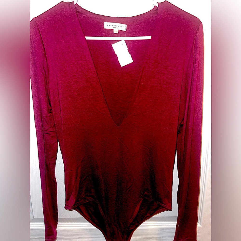 Long sleeve burgundy low cut top